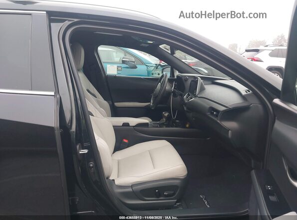 JTHX6JBH4P2142029 2023 LEXUS UX Черный Вид салона спереди