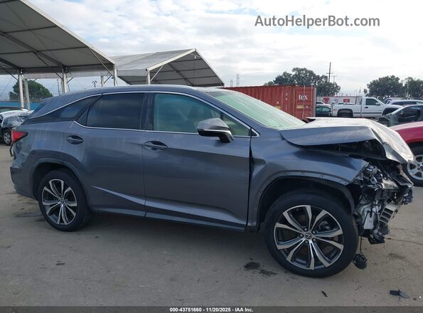 JTJDZKCA4K2019615 2019 LEXUS RX 350L Серый Вид задней части салона