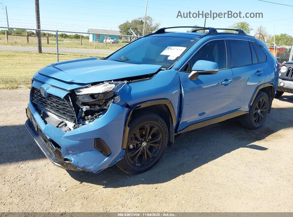 JTM16RFV7PD091796 2023 TOYOTA RAV4 HYBRID Blue Vista tres cuartos delantera izquierda