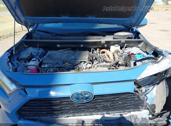 JTM16RFV7PD091796 2023 TOYOTA RAV4 HYBRID Blue Vista trasera