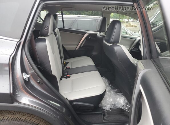 JTMDFREV9GJ065751 2016 TOYOTA LIMITED Gray Vista interior trasera
