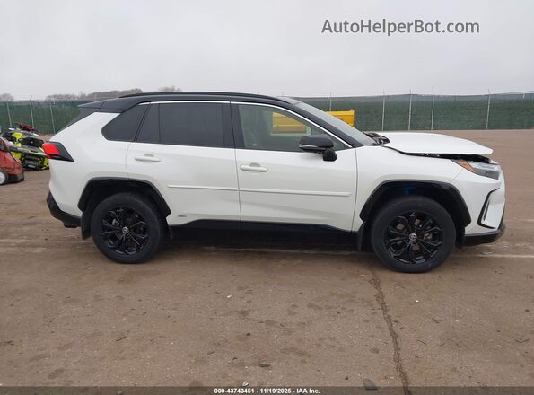 JTME6RFV0ND531341 2022 TOYOTA RAV4 HYBRID White Vista interior trasera