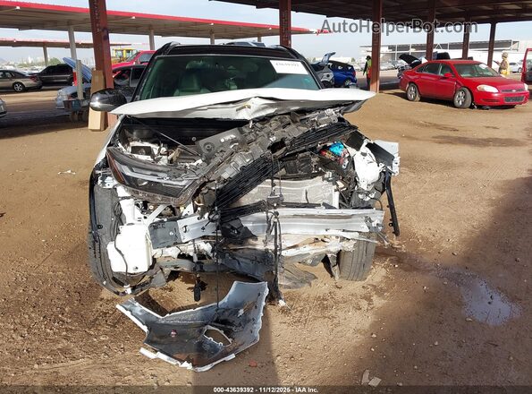 JTME6RFV2PD549181 2023 TOYOTA RAV4 HYBRID White Vista interior trasera