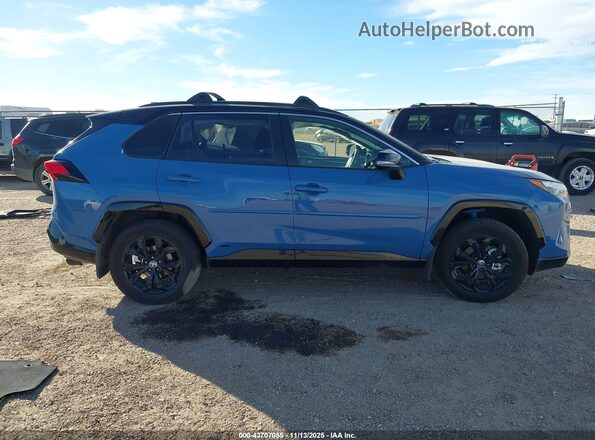 JTME6RFV9SD580520 2025 TOYOTA RAV4 HYBRID Blue Widok wnętrza z tyłu