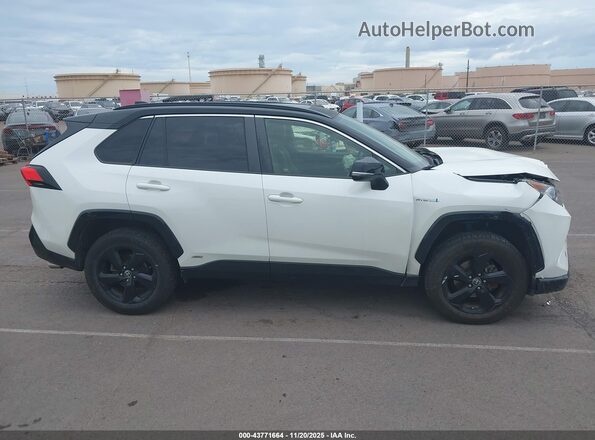 JTME6RFVXMJ005217 2021 TOYOTA RAV4 HYBRID White Вид задньої частини салону
