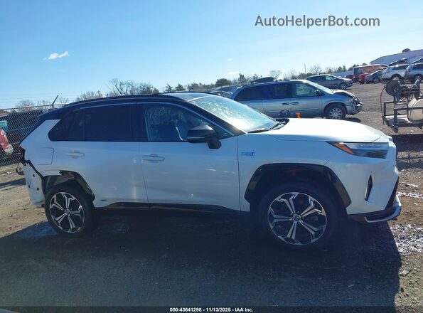 JTMEB3FV0ND086320 2022 TOYOTA RAV4 PRIME White Вид задньої частини салону