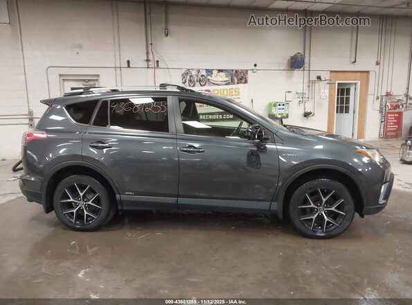 JTMJJREV4HD080725 2017 TOYOTA RAV4 HYBRID Gray Вид задньої частини салону