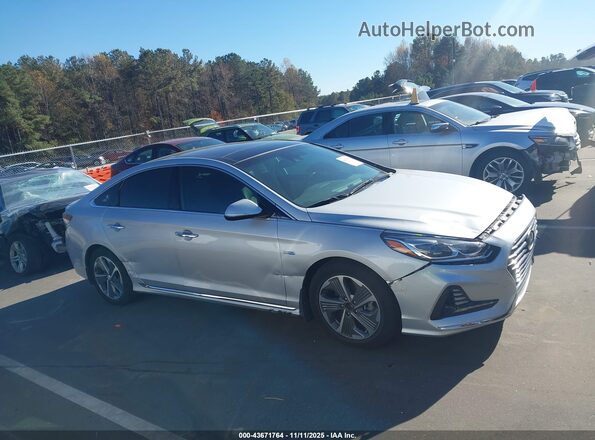 KMHE34L39KA093166 2019 HYUNDAI SONATA HYBRID Silver Rear interior view