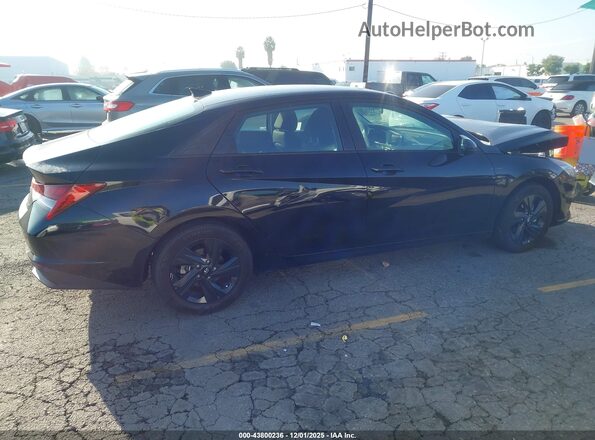 KMHLM4AJ5PU079292 2023 HYUNDAI ELANTRA HYBRID Черный Вид задней части салона