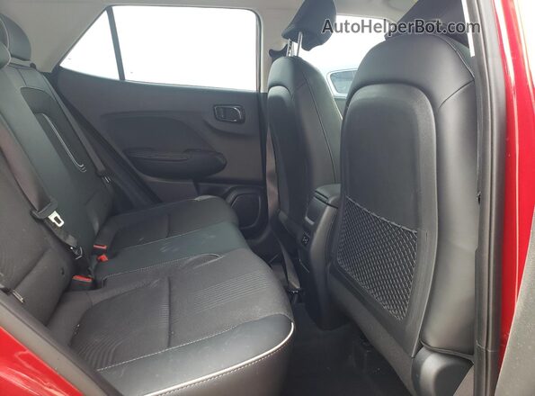 KMHRC8A37RU325140 2024 HYUNDAI VENUE Красный Вид задней части салона