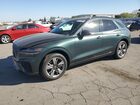 2022 Genesis Gv70 Base Green vin: KMUMCDTC8NU034559
