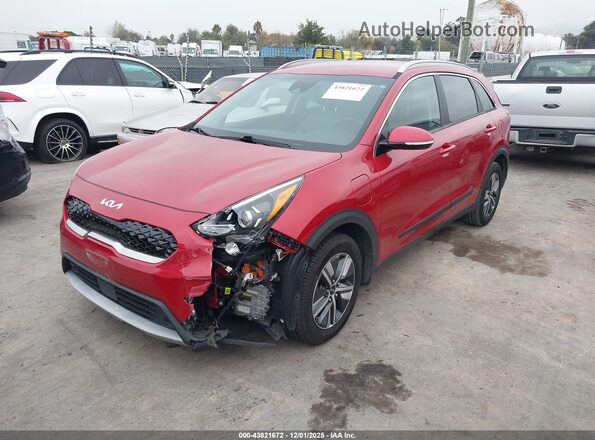 KNDCD3LD7N5511216 2022 KIA NIRO PLUG-IN HYBRID Red Vista tres cuartos delantera izquierda