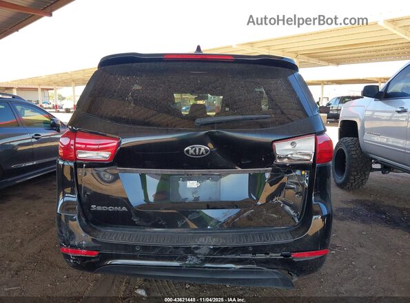 KNDMB5C14H6324090 2017 KIA SEDONA Black Widok z przodu