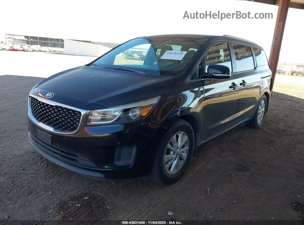 KNDMB5C14H6324090 2017 KIA SEDONA Black Przód lewy