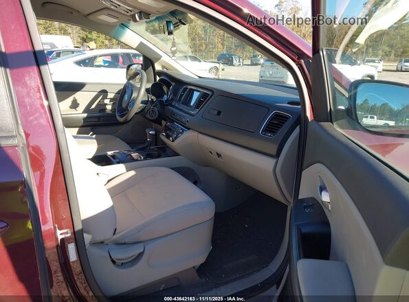 KNDMB5C1XJ6410025 2018 KIA SEDONA Бордовый Вид салона спереди