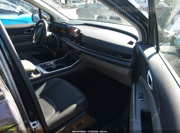 KNDNC5KA2S6075413 2025 KIA CARNIVAL MPV HYBRID Gray Widok wnętrza z przodu