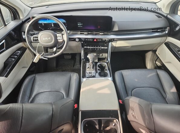 KNDNE5H37P6257991 2023 KIA CARNIVAL Черный Вид панели приборов