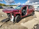 2022 Buick Envision Essence Burgundy vin: LRBFZPR42ND031411