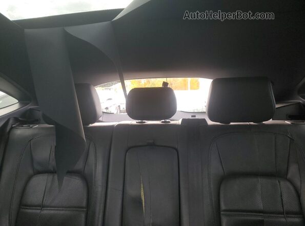 SADFP2FX4K1Z64270 2019 JAGUAR E-PACE Black Vista de los asientos traseros