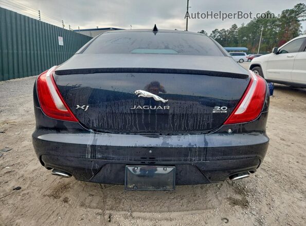 SAJWJ1CD5G8W00151 2016 JAGUAR XJ Черный Вид сзади