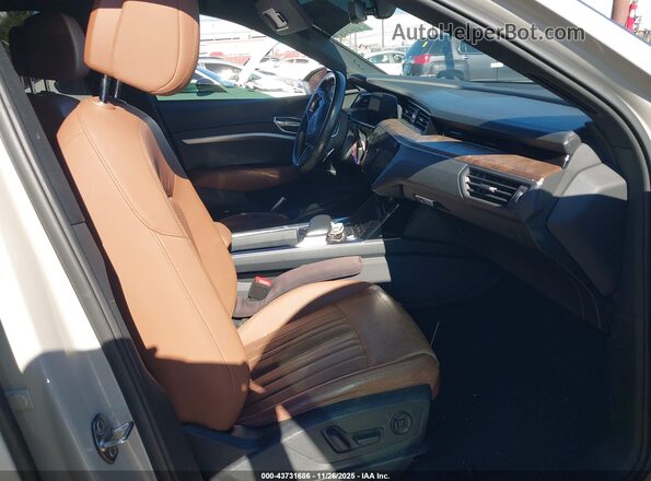 WA1LAAGE2KB011830 2019 AUDI E-TRON Cream Front interior view