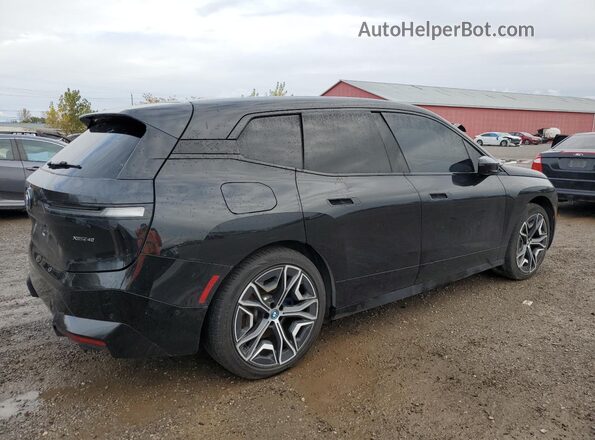 WB513CF06PCK76448 2023 BMW IX Black Trasero derecho