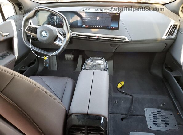 WB523CF04RCN52035 2024 BMW IX Black Вид панелі приладів