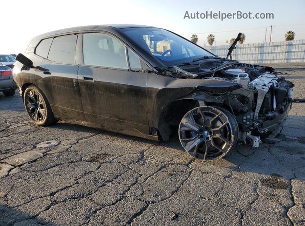 WB523CF04RCN52035 2024 BMW IX Black Передня права чверть