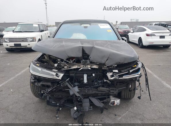 WB533CF06SCS53401 2025 BMW IX Black Սալոնի հետևի տեսք