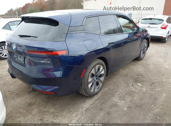 WB543CF00TCV89079 2026 BMW IX Blue Trasero derecho