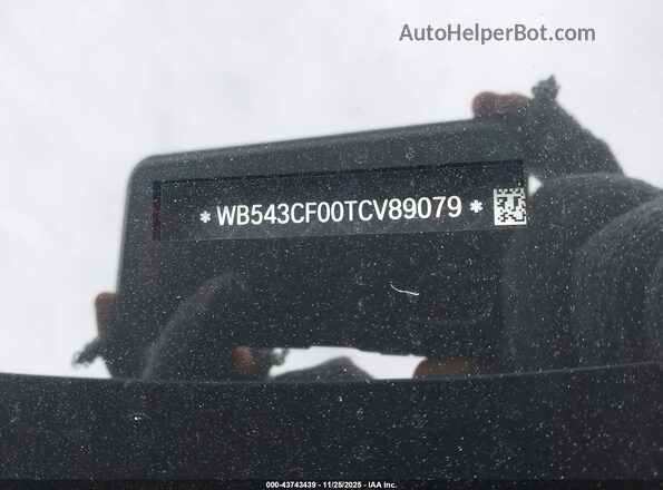 WB543CF00TCV89079 2026 BMW IX Blue Vista del compartimento del motor