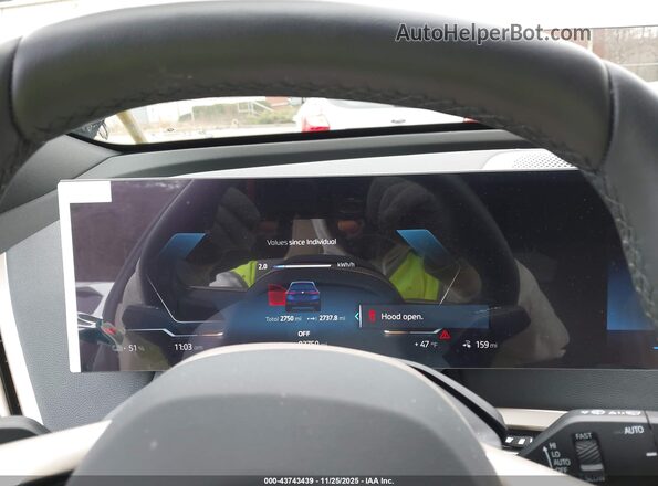 WB543CF00TCV89079 2026 BMW IX Blue Vista de los asientos traseros