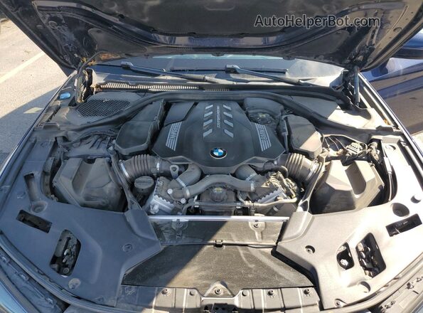 WBA13BK08MCF39491 2021 BMW M5 Blue Widok wnętrza z tyłu