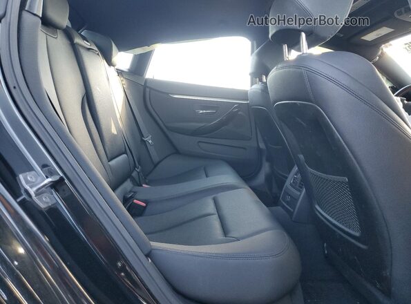 WBA4J3C52KBL09027 2019 BMW OTHER Black Widok tylnych siedzeń