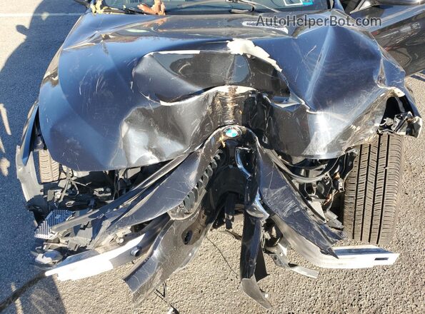 WBA4J3C52KBL09027 2019 BMW OTHER Black Widok wnętrza z tyłu