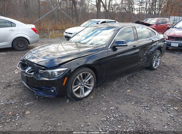 WBA4J7C59JBH14150 2018 BMW OTHER Black Przód lewy