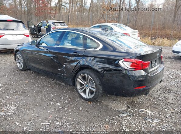 WBA4J7C59JBH14150 2018 BMW OTHER Black Tył lewy