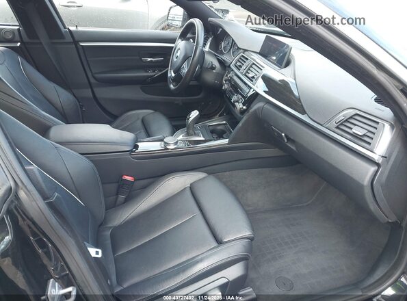 WBA4J7C59JBH14150 2018 BMW OTHER Black Widok wnętrza z przodu