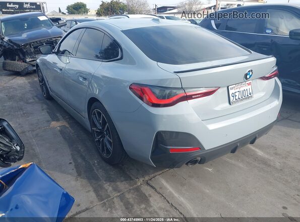 WBA63AV0XPFP24167 2023 BMW OTHER Gray Trasero izquierdo