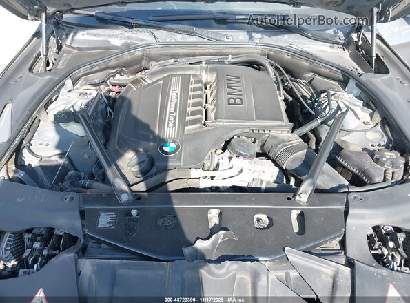 WBA6D0C52GD927619 2016 BMW OTHER Gray Вид ззаду