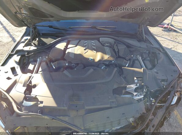WBA7U2C05NCH54835 2022 BMW OTHER Gray უკანა ხედი