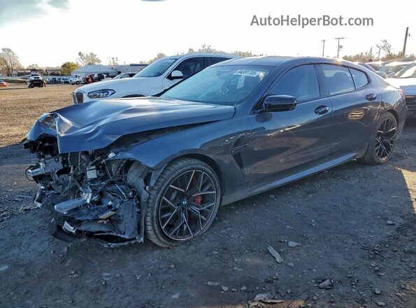 WBSGV0C03NCH16601 2022 BMW M8 Gray Vista tres cuartos delantera izquierda