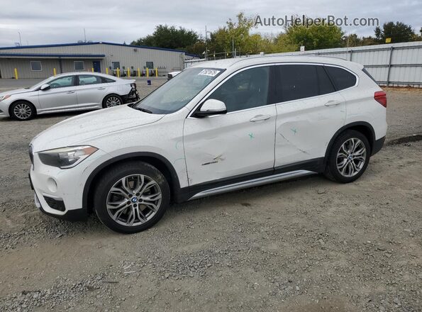 WBXHT3C32GP889552 2016 BMW X1 White Front left