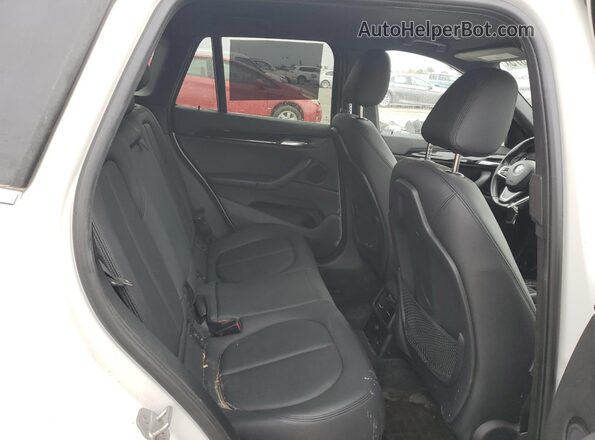WBXHT3C32GP889552 2016 BMW X1 White Rear seats view