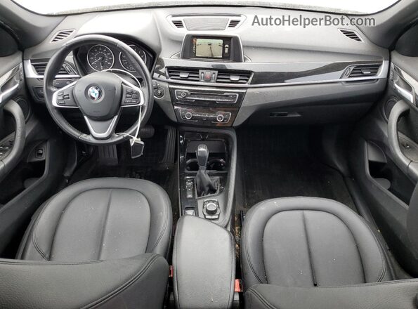 WBXHT3C32GP889552 2016 BMW X1 White Dashboard view
