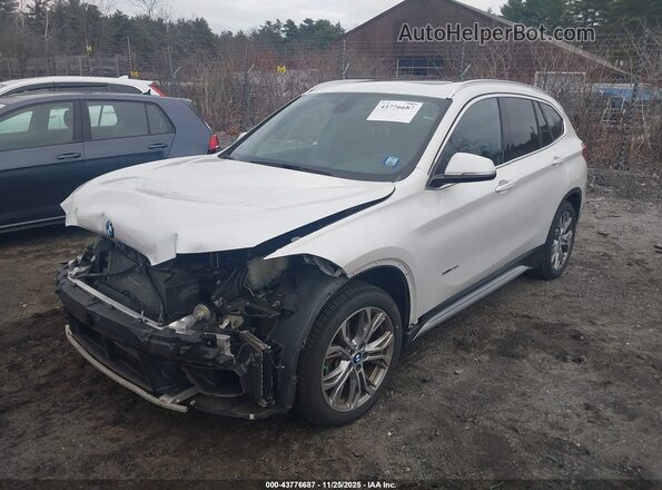 WBXHT3C33H5F72265 2017 BMW X1 Белый Передняя левая четверть