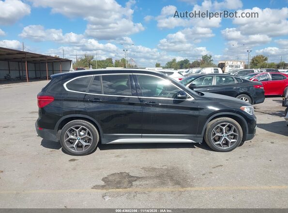 WBXHT3C52K3H35489 2019 BMW X1 Black Вид задньої частини салону