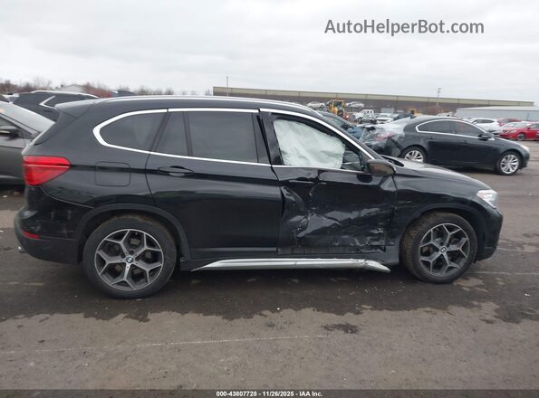 WBXHT3C59K5L35558 2019 BMW X1 Black Вид задньої частини салону