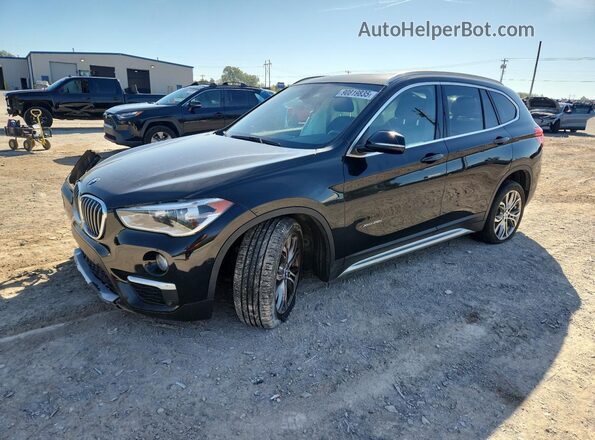 WBXHT3Z33G4A50280 2016 BMW X1 Черный Передняя левая четверть