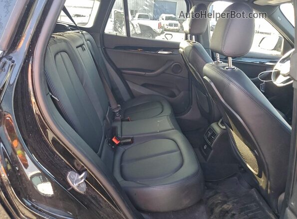 WBXHU7C35HP924607 2017 BMW X1 Черный Вид задних сидений